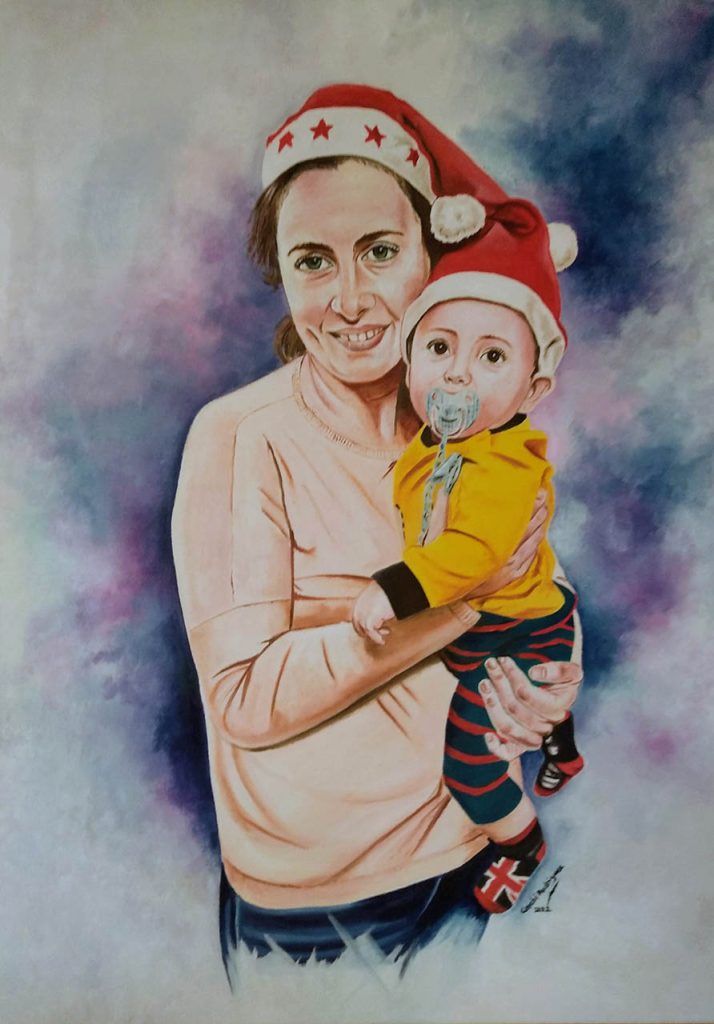 Mamá con su bebé en Navidad